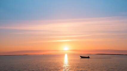 Fototapeta premium the sun sets over a body of water on a clear day and boats floating in the water