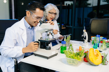 Team Asian scientists in a lab conducting food research using a microscope and lab equipment, showcasing innovation