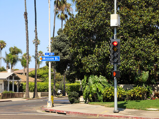 The Mission Bl. sign and intersection traffic light.