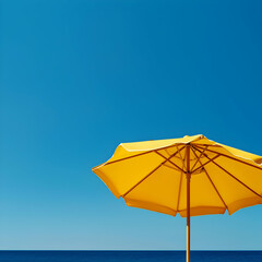 Yellow Beach Umbrella Under a Vivid Blue Sky