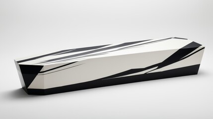 Modern coffin design with artistic black and white pattern on a neutral background