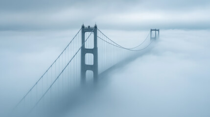 Foggy Golden Gate Bridge Emerging from Misty Clouds at Dawn