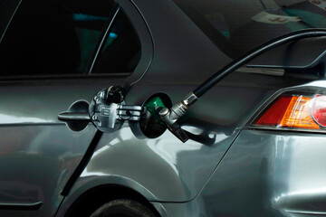 Car refueling on petrol station.photo can be used for automotive industry or transportation concept