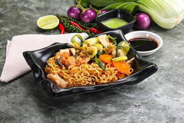 Asian cuisine - Fried noodles with seafood