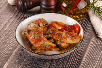 Baked lamb ribs with vegetables