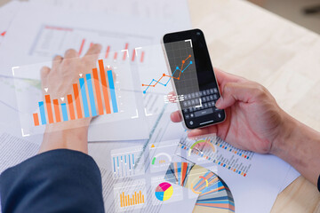 Businessman touch investment growth graph chart and analysing growth achievement diagram data...