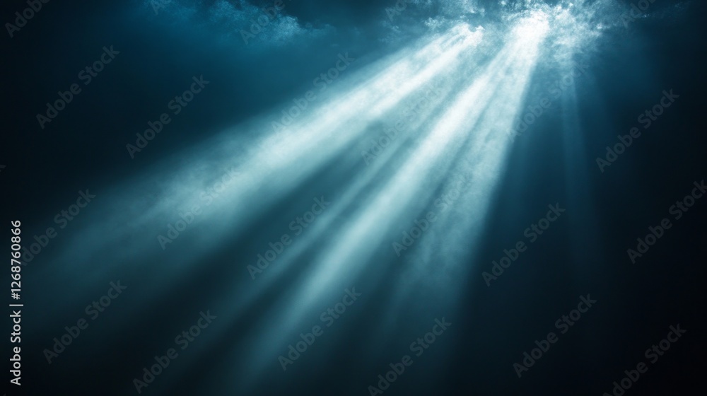 Poster Bright rays of light pierce through a dense, dark atmosphere, creating an ethereal glow that contrasts sharply with the surrounding shadows. This phenomenon inspires feelings of calmness and wonder