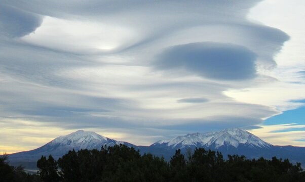 The Spanish Peaks are a pair of prominent mountains located in southwestern Huerfano County, Colorado. The Spanish Peaks were designated a National Natural Landmark in 1976.