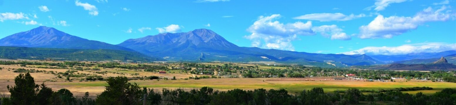 The Spanish Peaks are a pair of prominent mountains located in southwestern Huerfano County, Colorado. The Spanish Peaks were designated a National Natural Landmark in 1976.
