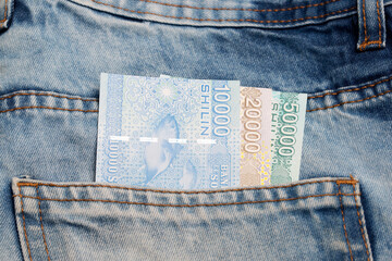 Somali Shilling  in the pocket of blue jeans