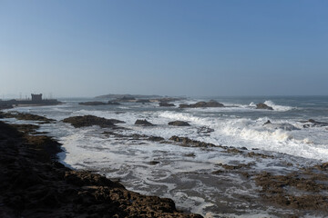 Atlantic ocean view with big waves and cliffs from Essaouira town Morocco