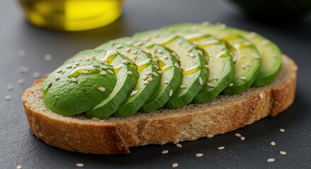 Delicious Avocado Toast with Olive Oil and Sesame Seeds Close-up