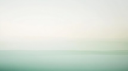 Fototapeta premium Soft gradient transition from pastel mint to light shades invokes a calming atmosphere of tranquility and serenity