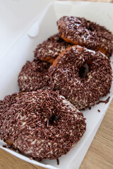 Close-up of donut with chocolate sprinkle.