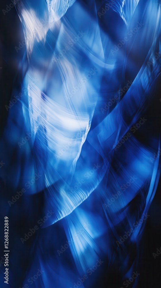 Poster exploring deep blue hues through an abstract bokeh effect with swirling patterns and textures