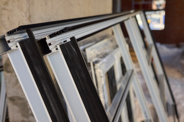 Stacked window frames are now fully prepared and ready for the upcoming installation process