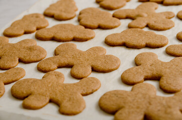 Thin gingerbread cookies on the New Year's table