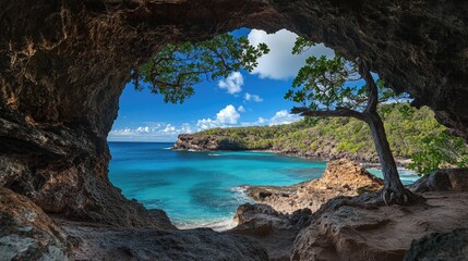 A hidden cave with a natural rock arch opening to a stunning ocean view