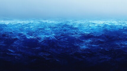 Fototapeta premium A calming ocean scene showcasing deep blue waters gently rolling under a serene sky, evoking tranquility and a sense of vastness.
