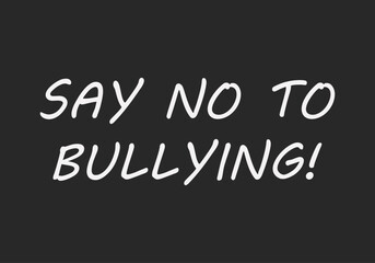 Obraz premium Texto de di no al acoso escolar o bullying en fondo negro de pizarra