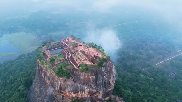 view of the famous ancient stone fortress Sigiriya (Lion Rock) on the island of Sri Lanka, which is a UNESCO World Heritage Site.