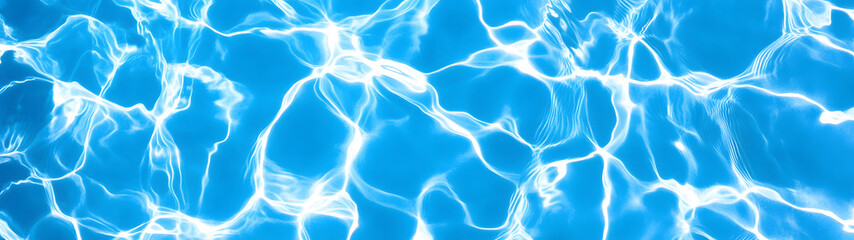 Captivating underwater view of a swimming pool with mesmerizing wavy ripples and shimmering reflections in vibrant aqua blue waters creating a serene and tranquil atmosphere