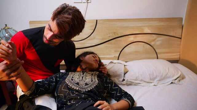 Lady already dead lying unresponsive in man arms over bed
