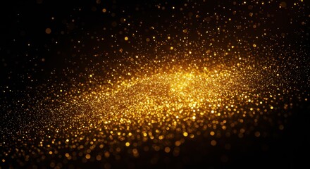 Obraz premium A close-up of vibrant golden glitter and light particles sparkling dynamically against a dark background