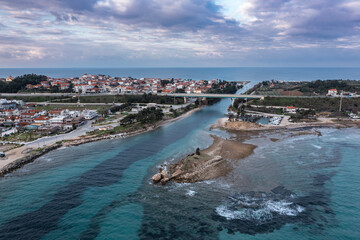 Aerial view at Nea Potidea canal, which connects Toroneos Bay with the Gulf of Thermaikos. Greece, Kassandra, Halkidiki