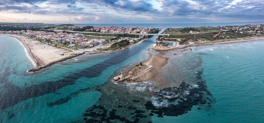 Aerial view at Nea Potidea canal, which connects Toroneos Bay with the Gulf of Thermaikos. Greece, Kassandra, Halkidiki