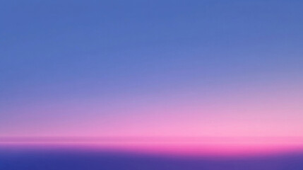 Stunning Gradient Sky at Dawn with Soft Hues of Pink and Blue Illuminating the Tranquil Horizon Over Calm Water Surface Reflecting Nature's Serenity