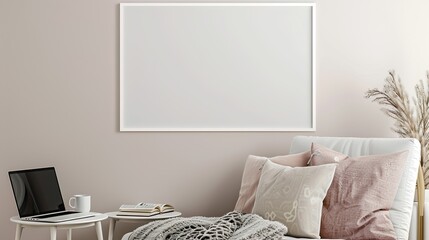A white rectangular frame above a cozy bedroom chair, with a cup, a laptop, and a book on a side table.  HD 8K mockup wallpaper Photographic Image