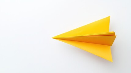 A bright yellow paper airplane soaring through a white background, symbolizing creativity, fun, and playful leisure activities. 