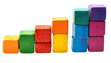 colorful wooden blocks stacked in an ascending order, symbolizing growth and progress