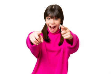 Little caucasian girl over isolated background surprised and pointing front