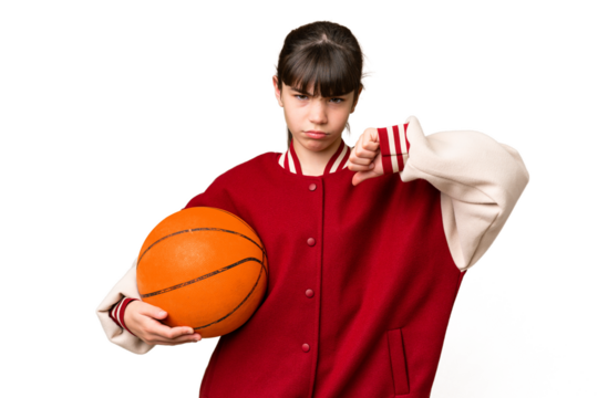 Little caucasian girl playing basketball over isolated background showing thumb down with negative expression