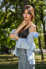 Fototapeta premium Portrait of a young beautiful brunette girl