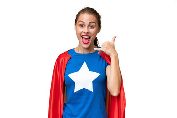 Super Hero caucasian woman over isolated background making phone gesture. Call me back sign © luismolinero