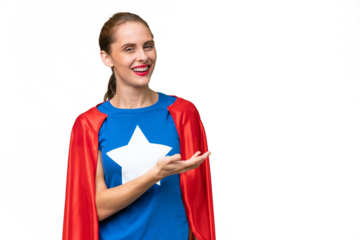 Super Hero caucasian woman over isolated background presenting an idea while looking smiling towards