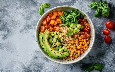 Vegan Buddha bowl with quinoa and avocado on a pastel background