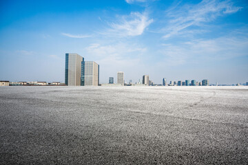 Urban Skyline Under a Clear Blue Sky with Rooftop Perspective