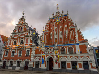 View of the facade of the Blackheads House at sunrise, Riga