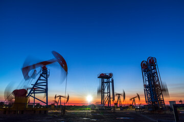 In the evening, the outline of the oil pump