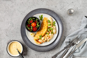 Baked cauliflower with omelet and cheese souffle