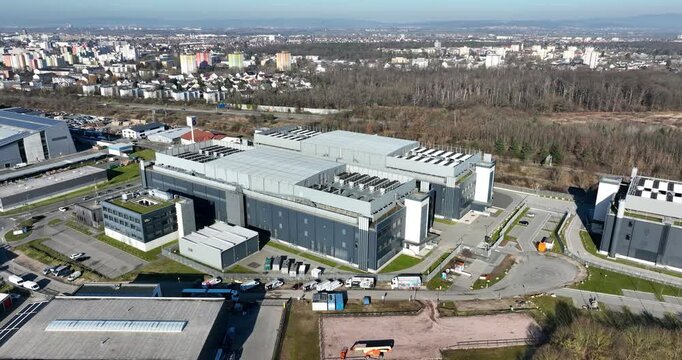 Data centers, computer centre, infrastructure for quantum computing, machine learning, AI, internet technology. Aerial drone footage