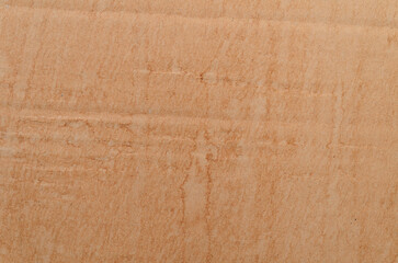 Vintage brown cardboard texture with natural stains and rough surface