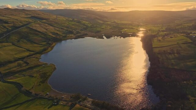 Aerial video of semer water sunset yorkshire dales uk.