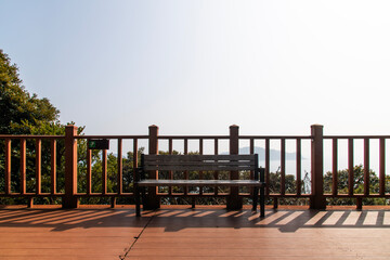 View of the wooden bench and fence at the seaside observatory
