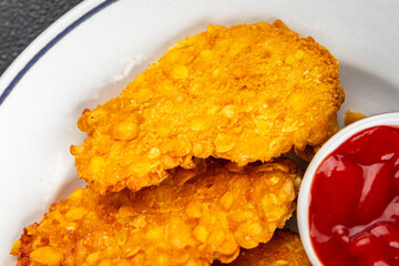 Nuggets chicken meat breaded deep fried fresh tasty food dish gourmet food background on the table rustic food top view copy space