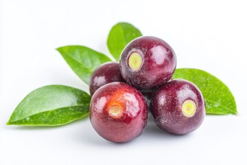 Obraz premium A group of berries with leaves on a white surface, great for food or nature-themed designs